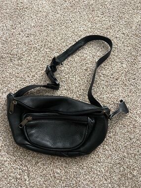 Vintage EKA black leather Fanny pack or sling crossbody bag.